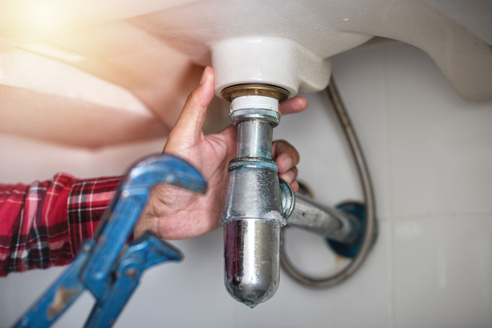 Plumber tightening loose pipes Seattle, WA Plumber tightening loose pipes Seattle, WA