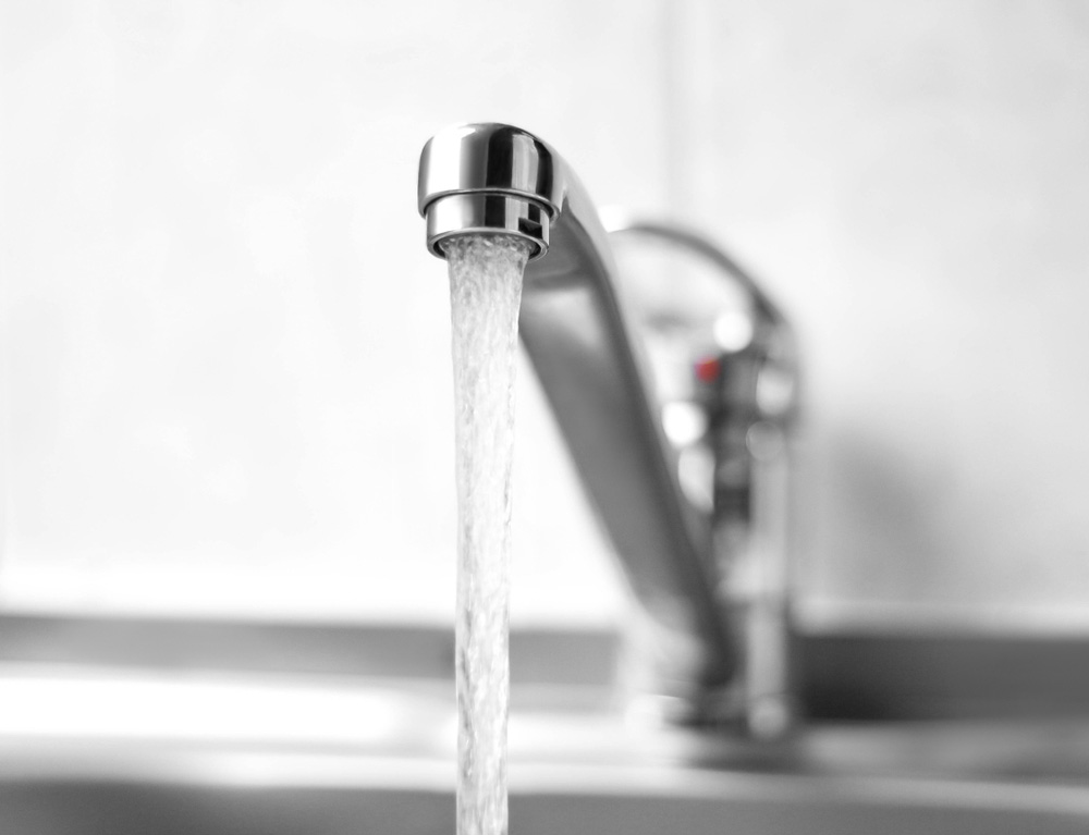 A running water faucet A running water faucet