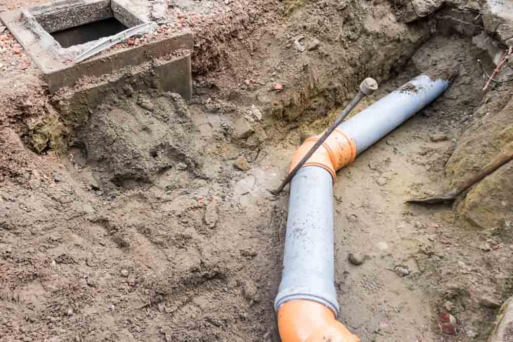 sewer repair outdoors in a commercial property sewer repair outdoors in a commercial property