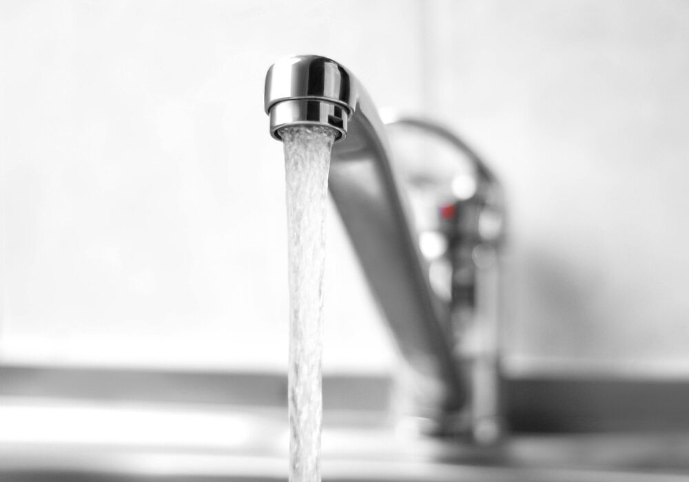 A running water faucet